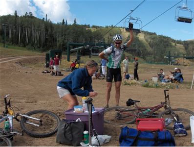 Hanging from a chairlift while Anna hustles the transition